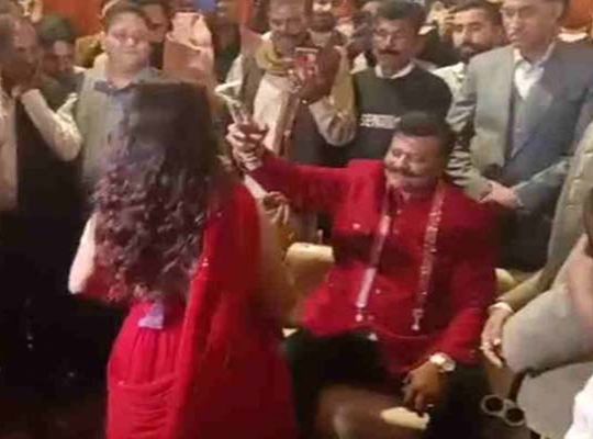 Former MLA Champion was seen throwing money at a dancer at a wedding ceremony, and the video sparked a political firestorm.