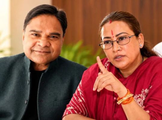 Politics: Husband Girdhari Lal Sahu launches an offensive against Cabinet Minister Rekha Arya! He claims an alleged audio clip was created using AI and makes a major assertion regarding assets worth 210 crore.